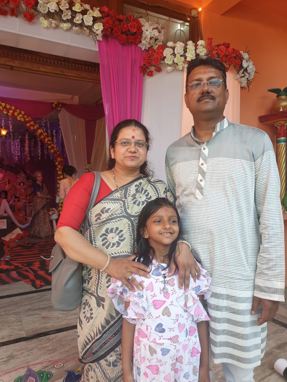 Ahin and Divya Pande with family — your hosts at Ashirwad Homestay, Bhimtal