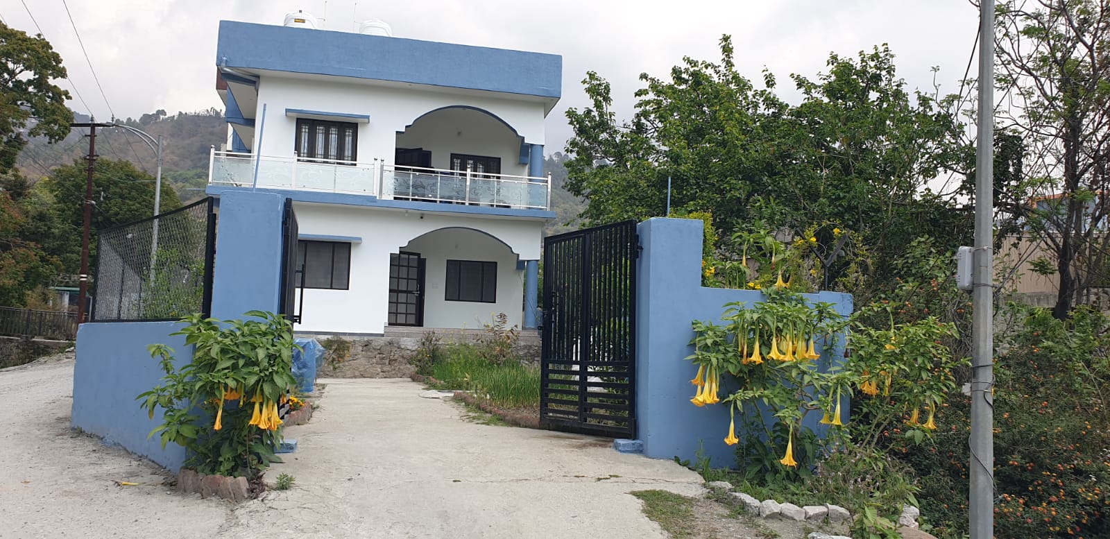 Ashirwad Homestay — front of property in daylight