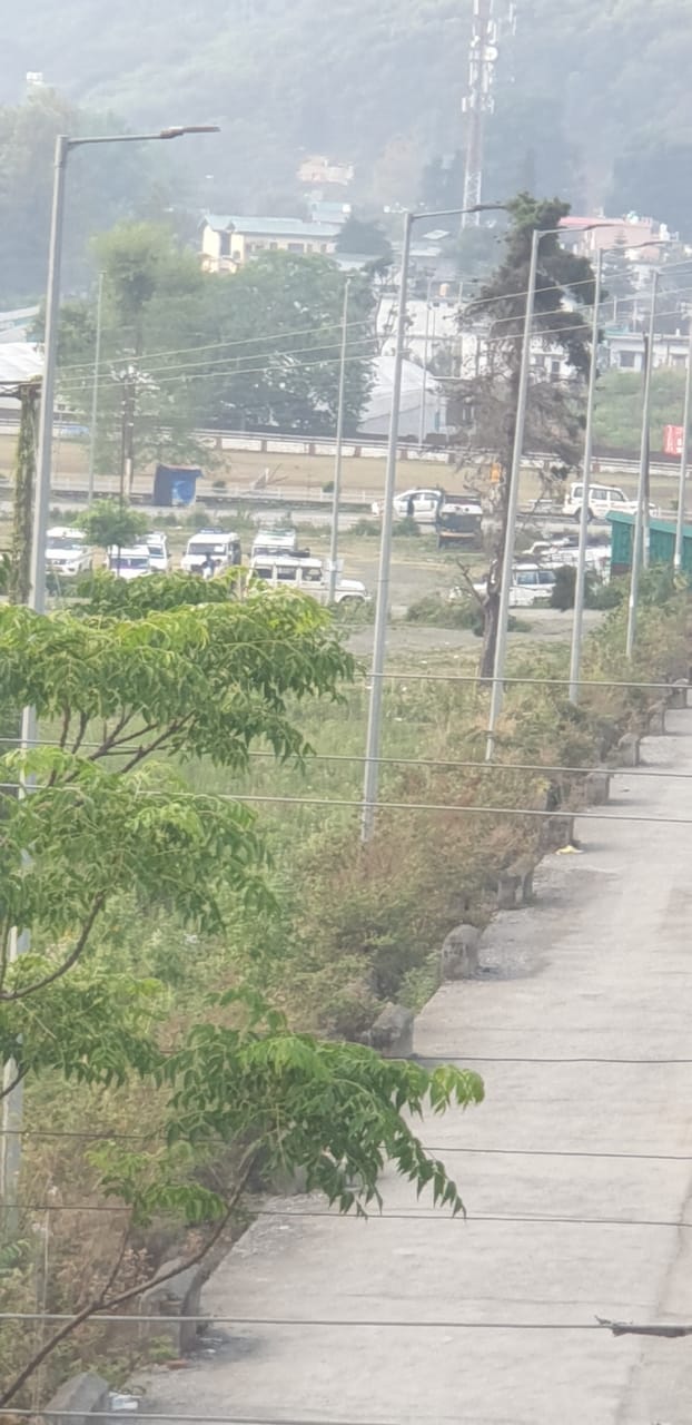 Shuttle parking area as seen from Ashirwad Homestay rooftop — 200 metres away
